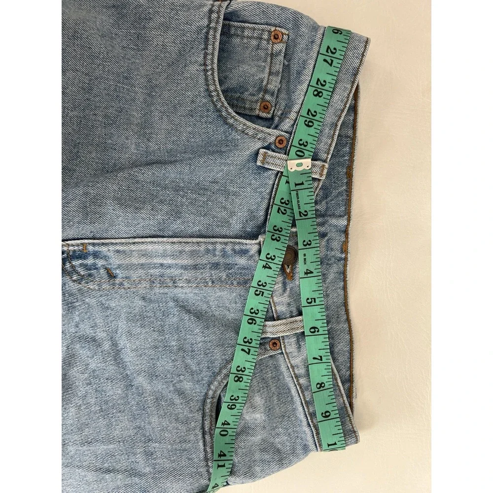 Vintage 90s Levis 560 Loose Fit Tapered Leg Jeans 29x34 Made in USA Light Wash